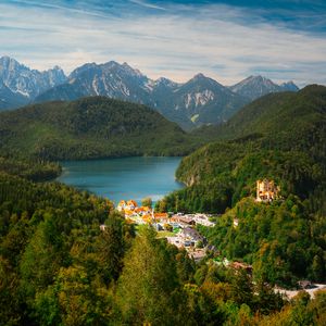Preview wallpaper city, trees, forest, lake, mountains, clouds, sky, landscape