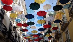 Preview wallpaper city, umbrellas, colorful, sky, flying