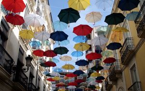 Preview wallpaper city, umbrellas, colorful, sky, flying