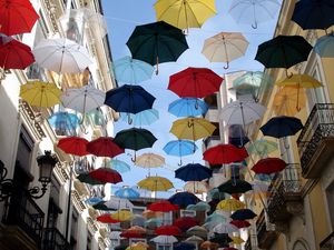 Preview wallpaper city, umbrellas, colorful, sky, flying