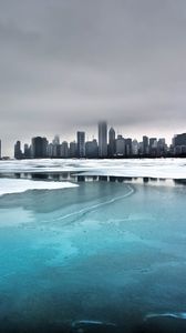 Preview wallpaper city, winter, ocean, coast, ice, fog, cold