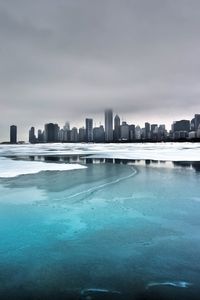 Preview wallpaper city, winter, ocean, coast, ice, fog, cold