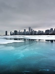 Preview wallpaper city, winter, ocean, coast, ice, fog, cold