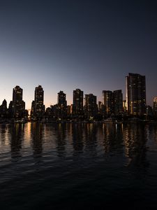 Preview wallpaper cityscape, river, sky, skyscrapers, reflection, evening, vancouver, canada