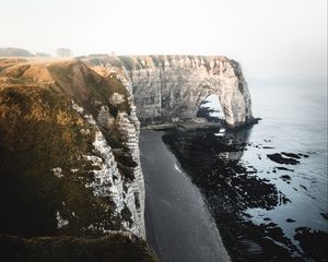 Preview wallpaper cliff, coast, beach, rocks, sea