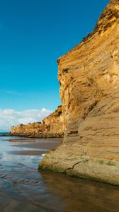 Preview wallpaper cliff, coast, sea, rocks, sky