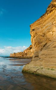 Preview wallpaper cliff, coast, sea, rocks, sky