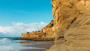 Preview wallpaper cliff, coast, sea, rocks, sky