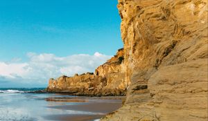 Preview wallpaper cliff, coast, sea, rocks, sky