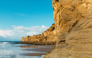 Preview wallpaper cliff, coast, sea, rocks, sky