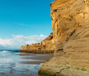 Preview wallpaper cliff, coast, sea, rocks, sky