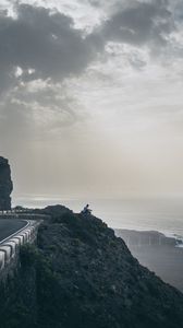 Preview wallpaper cliff, coast, silhouette, sea, road