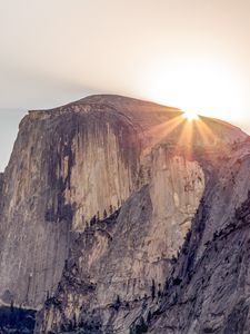 Preview wallpaper cliff, mountain, light, sky