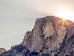 Preview wallpaper cliff, mountain, light, sky