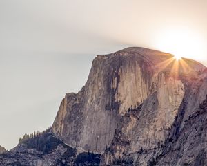 Preview wallpaper cliff, mountain, light, sky