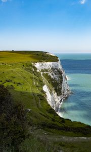 Preview wallpaper cliff, rock, coast, grass, sea