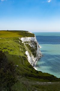 Preview wallpaper cliff, rock, coast, grass, sea