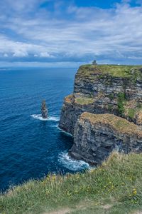 Preview wallpaper cliff, rock, sea, horizon, grass