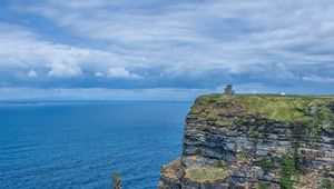 Preview wallpaper cliff, rock, sea, horizon, grass