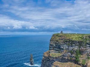 Preview wallpaper cliff, rock, sea, horizon, grass