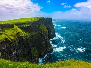 Preview wallpaper cliff, rock, surf, sea, grass