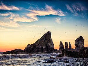 Preview wallpaper cliff, rock, waves, sea, sunset