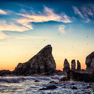 Preview wallpaper cliff, rock, waves, sea, sunset