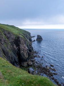 Preview wallpaper cliff, rocks, sea, horizon, stones