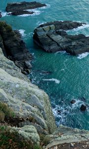 Preview wallpaper cliff, rocks, water, ocean