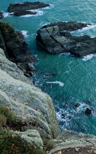 Preview wallpaper cliff, rocks, water, ocean