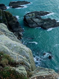 Preview wallpaper cliff, rocks, water, ocean