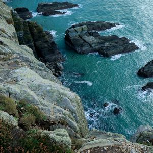 Preview wallpaper cliff, rocks, water, ocean