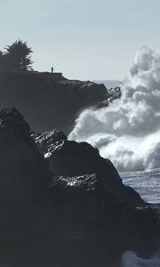 Preview wallpaper cliff, silhouette, alone, sea, waves, storm