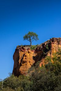 Preview wallpaper cliff, tree, relief, shadows, sky