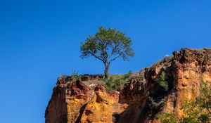 Preview wallpaper cliff, tree, relief, shadows, sky