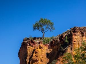 Preview wallpaper cliff, tree, relief, shadows, sky