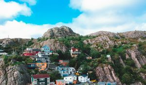 Preview wallpaper cliffs, buildings, coast, mountains, sea