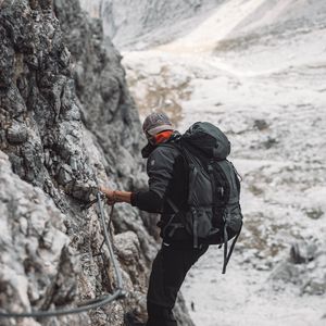 Preview wallpaper climber, man, equipment, rocks