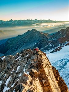 Preview wallpaper climber, traveler, rocks, snow, snowy