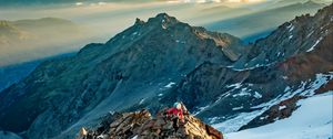 Preview wallpaper climber, traveler, rocks, snow, snowy