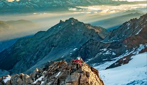 Preview wallpaper climber, traveler, rocks, snow, snowy