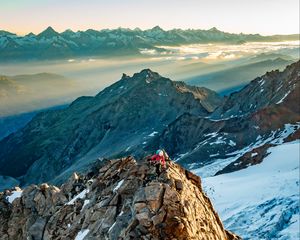 Preview wallpaper climber, traveler, rocks, snow, snowy