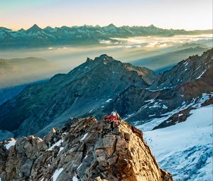 Preview wallpaper climber, traveler, rocks, snow, snowy