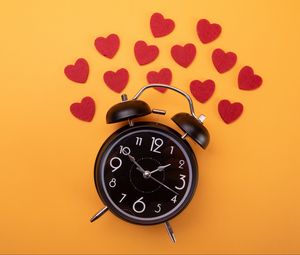 Preview wallpaper clock, alarm clock, time, hearts, orange