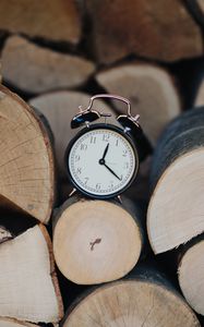 Preview wallpaper clock, alarm, time, wood, logs
