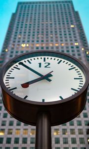 Preview wallpaper clock, building, skyscraper, city