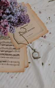 Preview wallpaper clock, lilac, flowers, notes