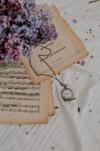 Preview wallpaper clock, lilac, flowers, notes