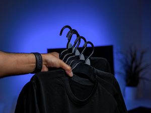 Preview wallpaper clothing, hoodie, hangers, hand, black