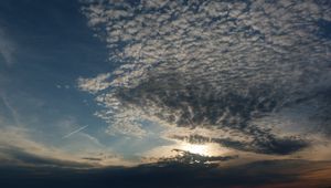 Preview wallpaper clouds, air, shadows, sea, evening, cloudy